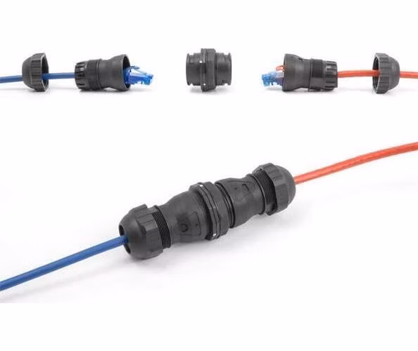 Delock Kabelový konektor ze zásuvky RJ45 na zásuvku RJ45, Cat.6A, s prachotěsností a vodotěsností IP68