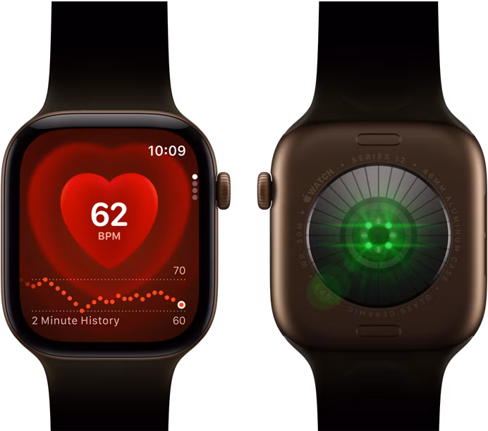 Dvoje Apple Watch Series 12, pouzdro z tmavě bronzového hliníku s olivovým sportovním řemínkem, na jedněch aplikace Srdeční tep, na druhých na zadní straně systém sledování zdraví se svítícími zelenými LED diodami